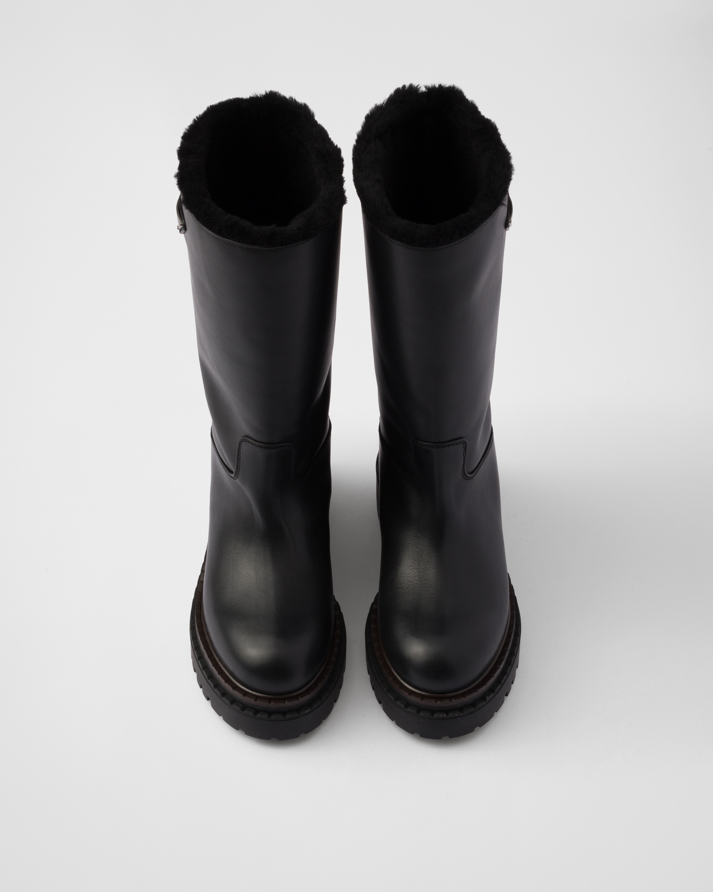 Leather and shearling boots - 4