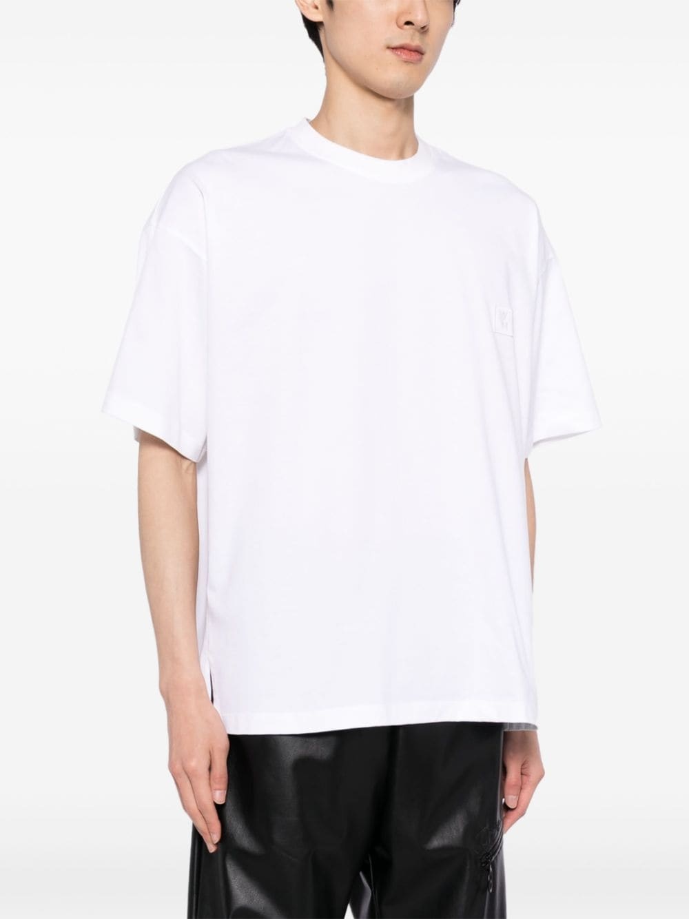 【WOOYOUNGMI】 グラフィック Tシャツ ユニセックス 送関込 Wooyoungmi graphic-print cotton T-shirt | REVERSIBLE