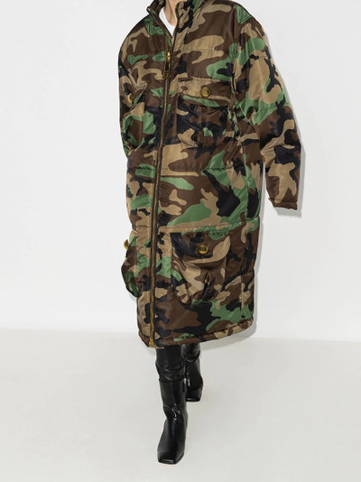 Moschino oversized padded camouflage-print coat outlook