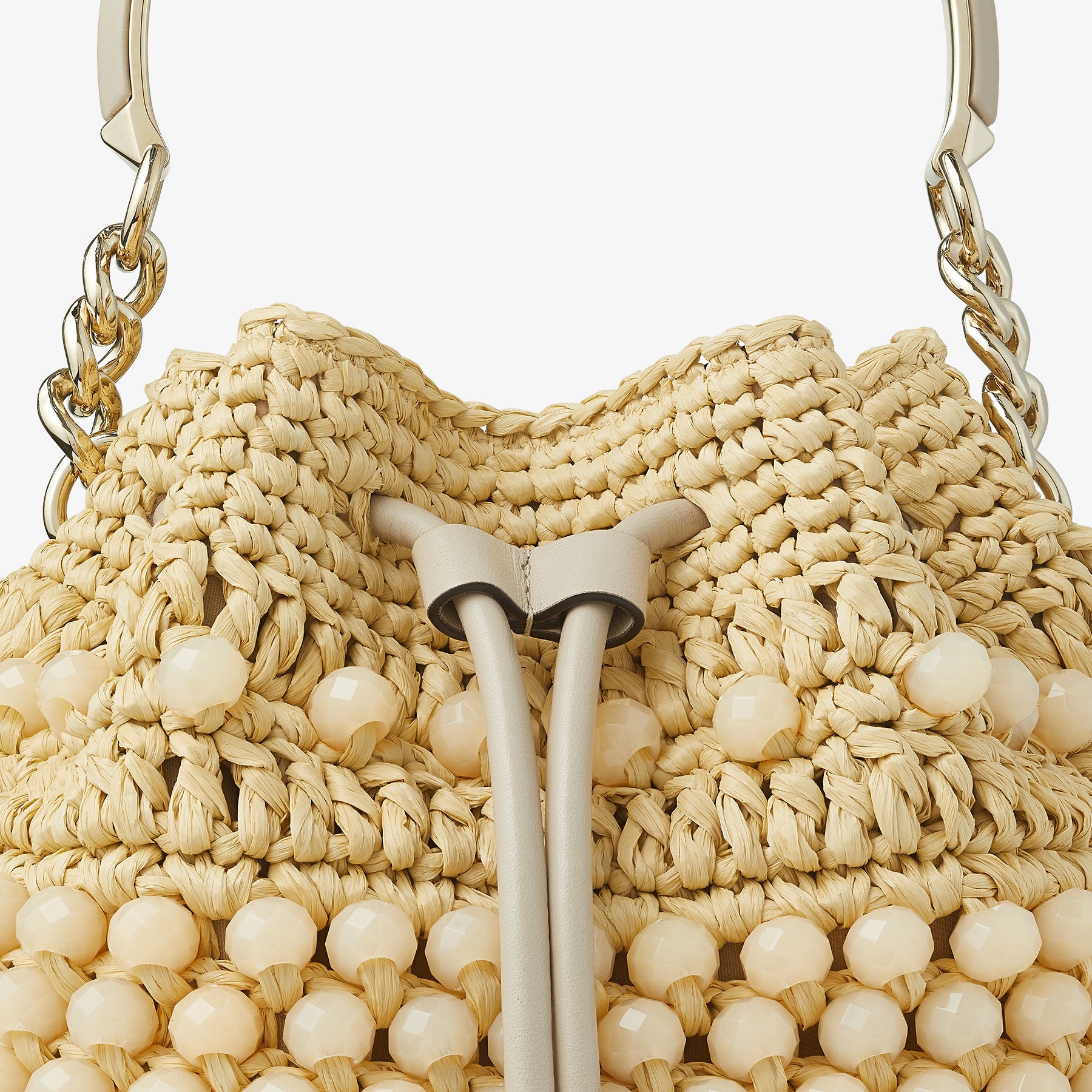 Bon Bon Bucket
Natural Beaded Raffia and Smooth Leather Bucket Bag - 7