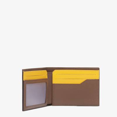 FENDI Bi-fold wallet with six cardholder slots and one banknote compartment. Made of textured fabric with  outlook