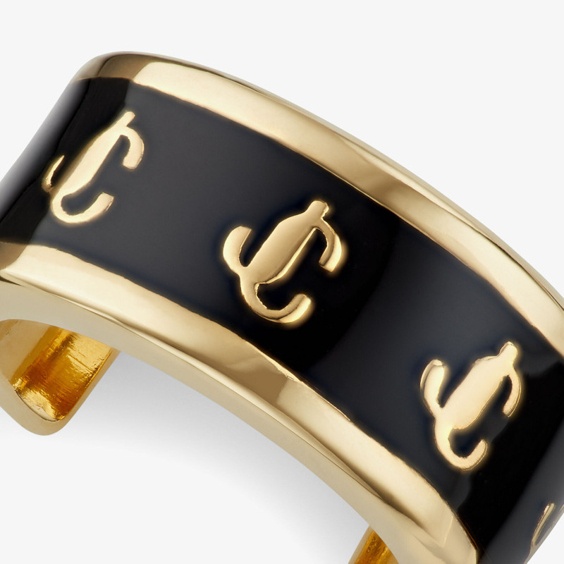 Single JC Ear Cuff
Gold-Finish Metal and Black Enamel JC Ear Cuff 5