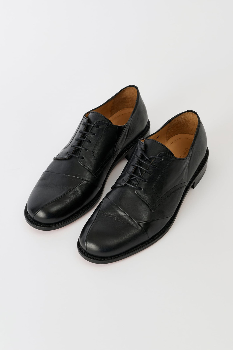 Patched Parade Malleable Black Bull Hide 7