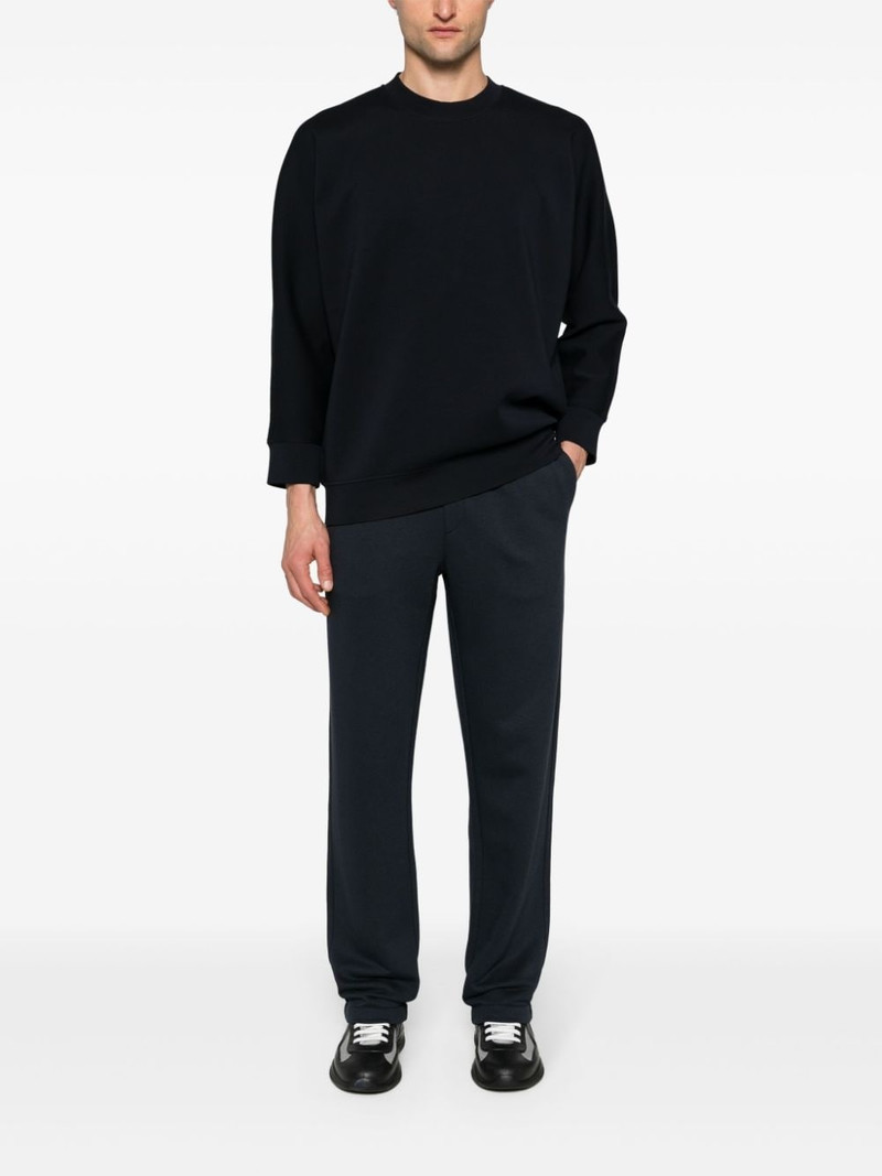 Moncler logo-appliquÃ© track pants outlook