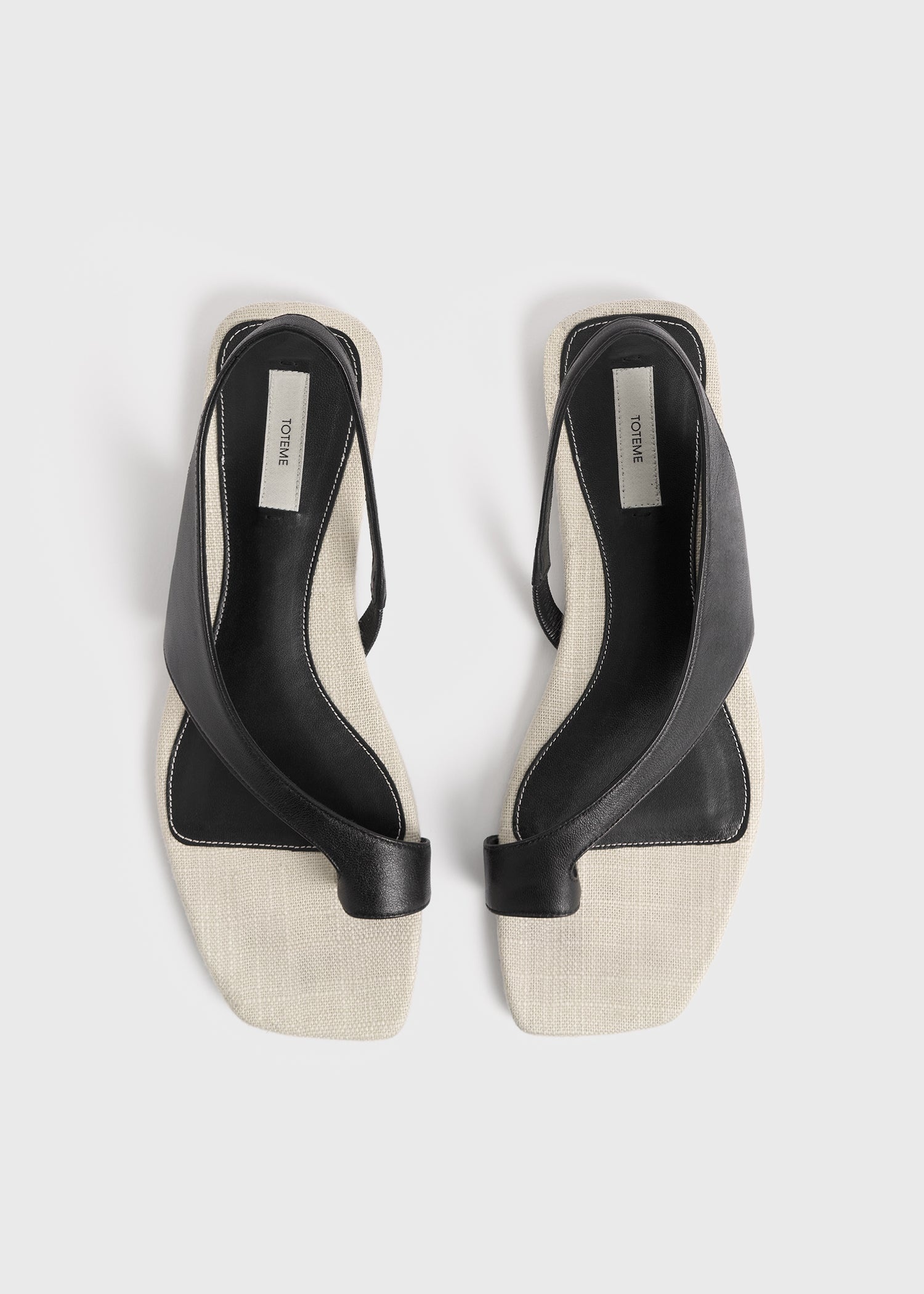 Totême Leather thong sandals black/sand | REVERSIBLE