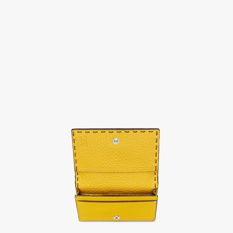 Card holder pouch with press-stud closure. Made of beige Cuoio Romano leather. Yellow Cuoio Romano l 3