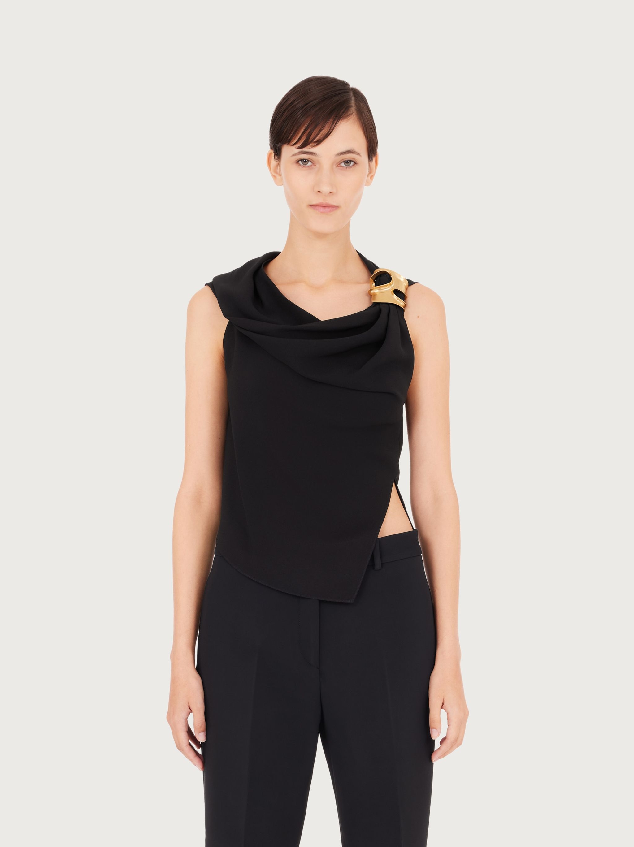 Asymmetric top with shoulder broach - 2