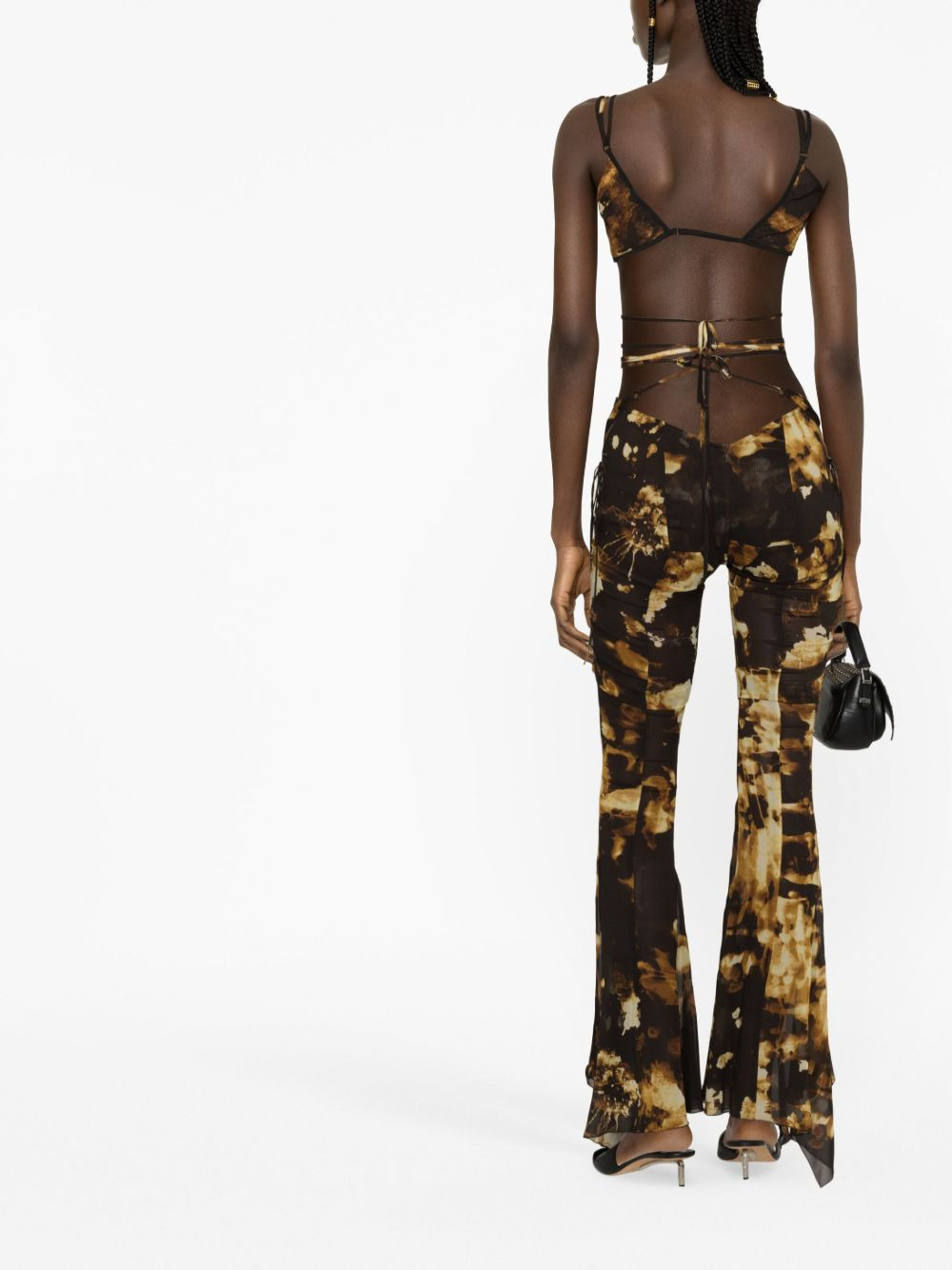 Starlight-print flared trousers - 4