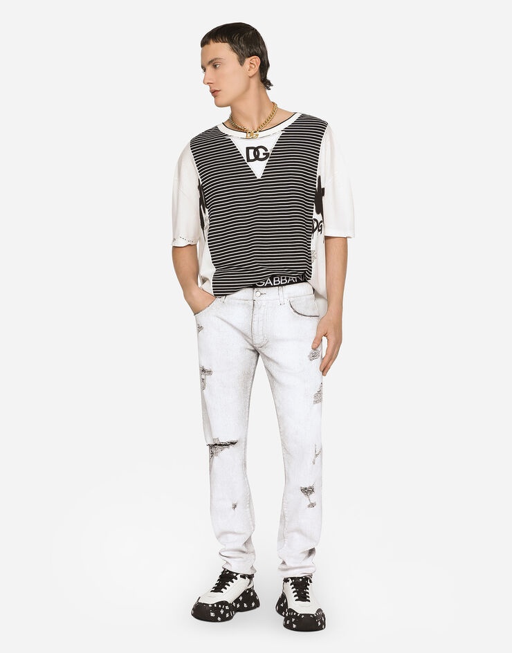 Coated skinny stretch jeans with rips - 1