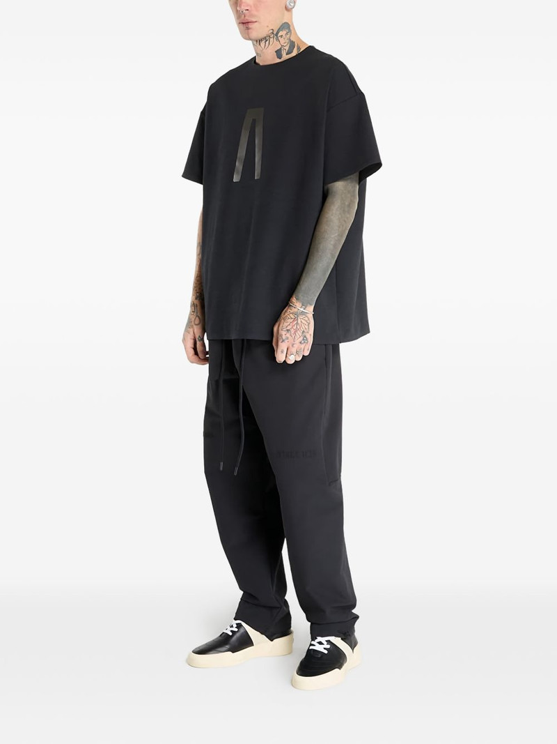 adidas Brushback woven storm track pants outlook