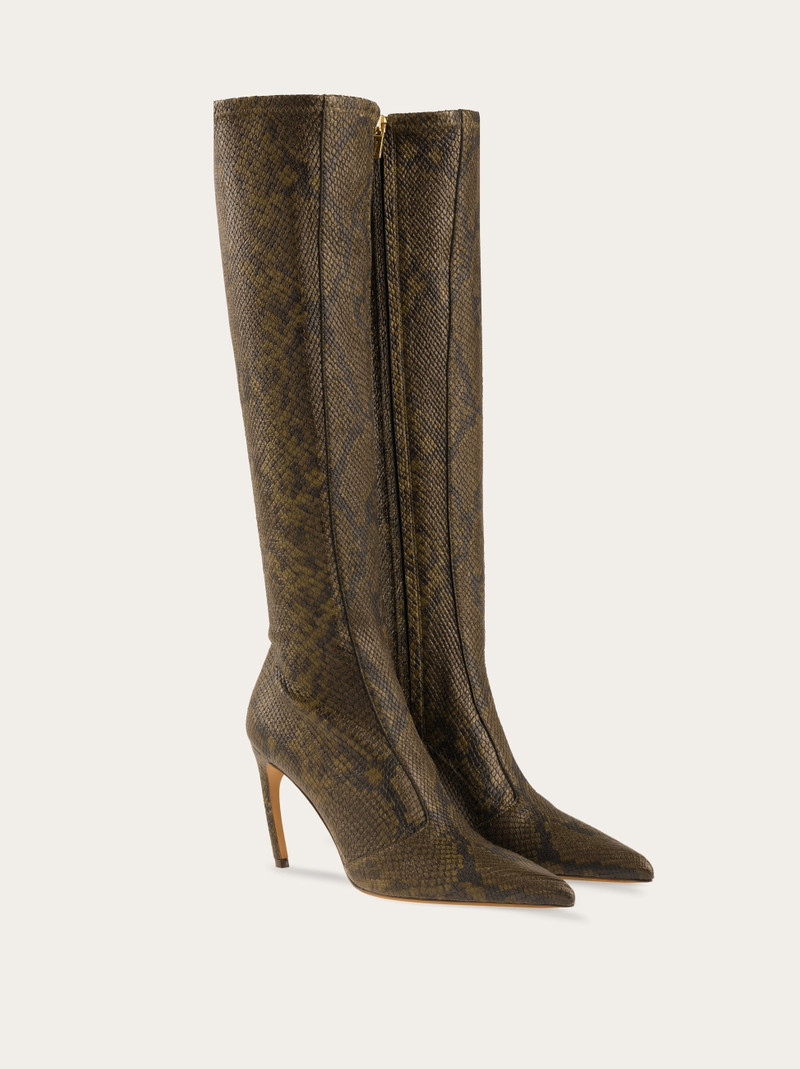 Knee high boot with curved heel 4