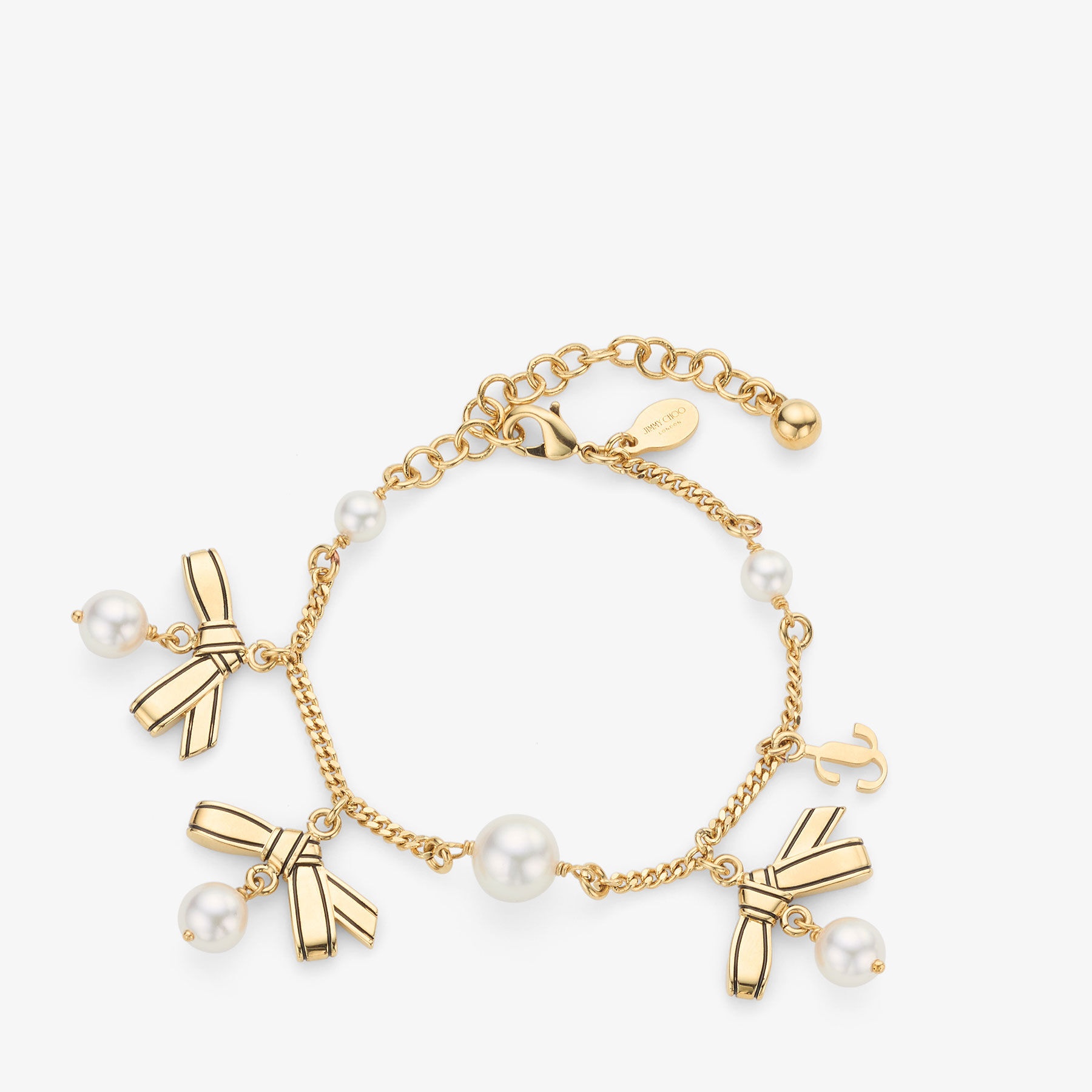Multi Charm Ribbon  Bracelet
Gold Metal Charm Bracelet with Ribbons & Pearls - 3