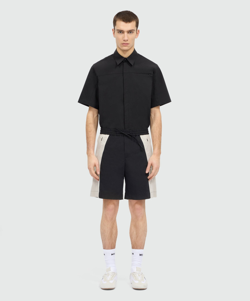 MSGM Black stretch cotton Bermuda shorts with color-block inserts. outlook