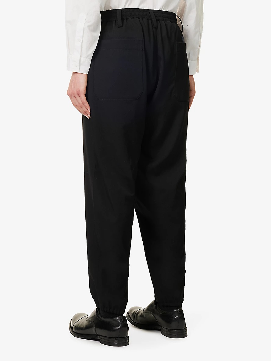 Flap-pocket mid-rise tapered-leg wool trousers - 4