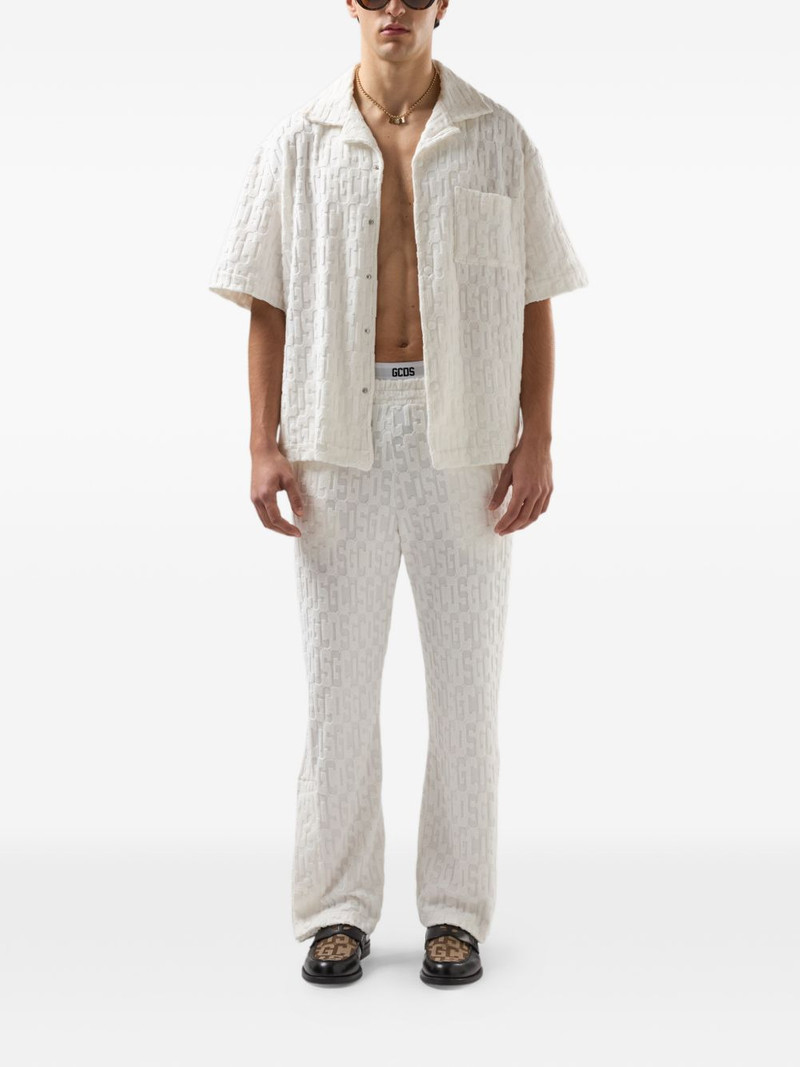 GCDS monogram-pattern trousers outlook