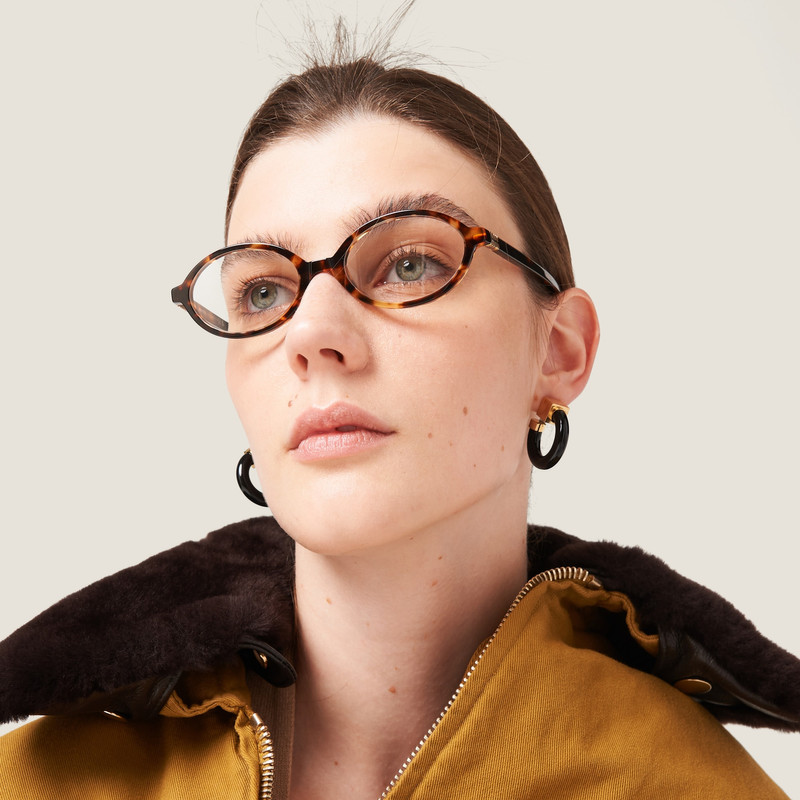 Miu Miu Plexiglas and metal earrings outlook