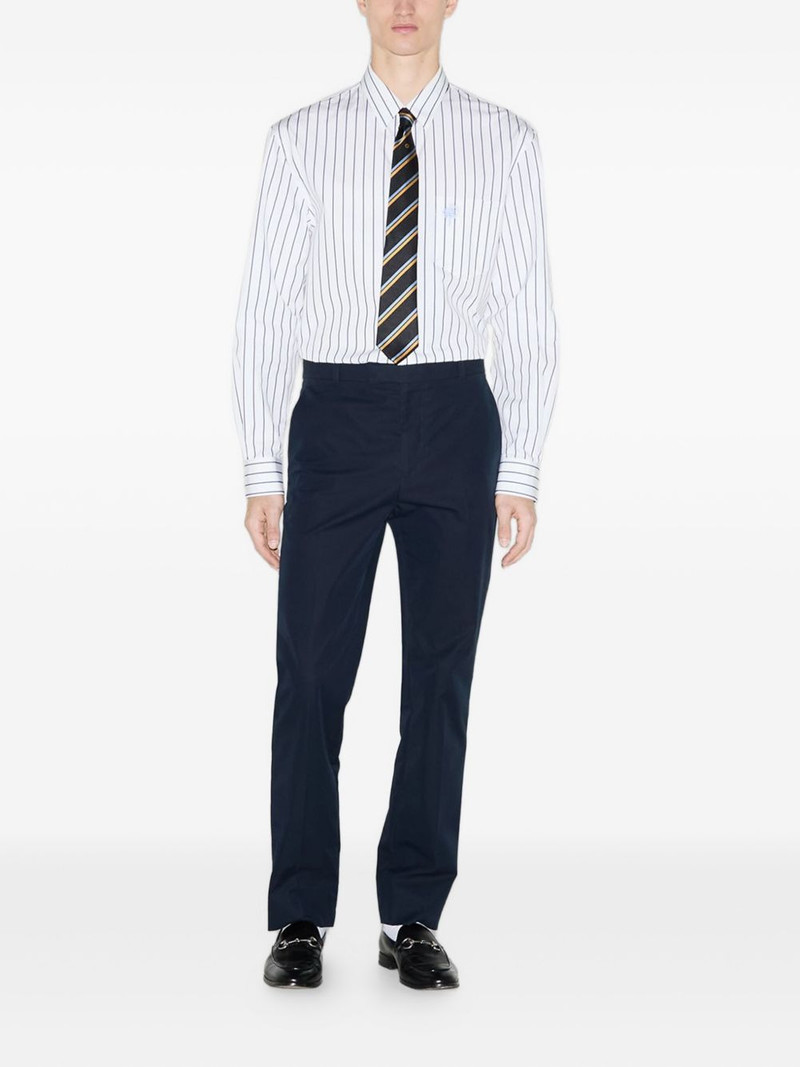 GUCCI embossed-logo twill trousers outlook
