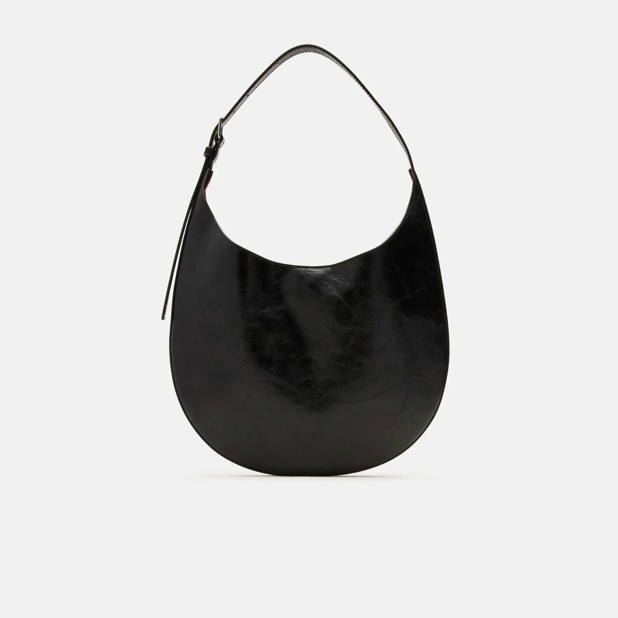 Round shoulder bag in crackled leather - 1