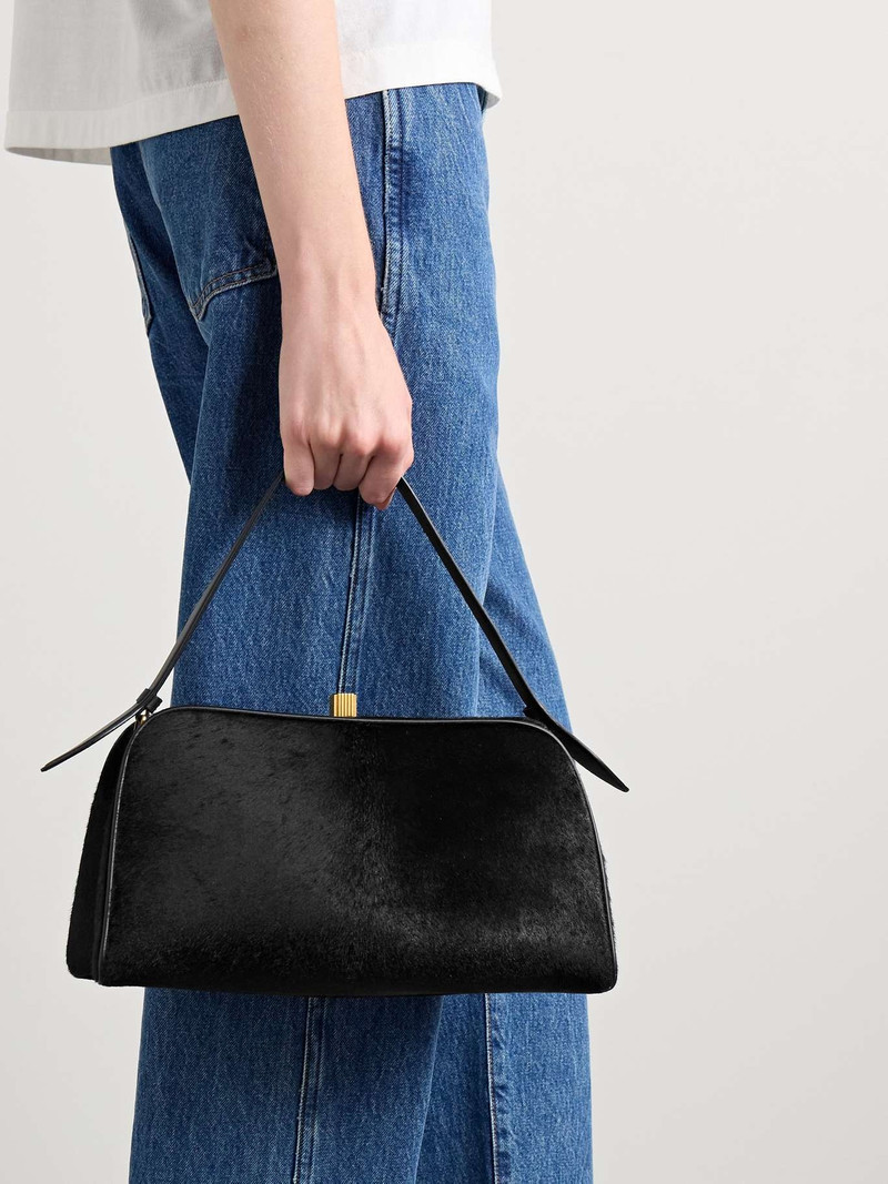 KHAITE Cate leather-trimmed calf hair tote Black outlook