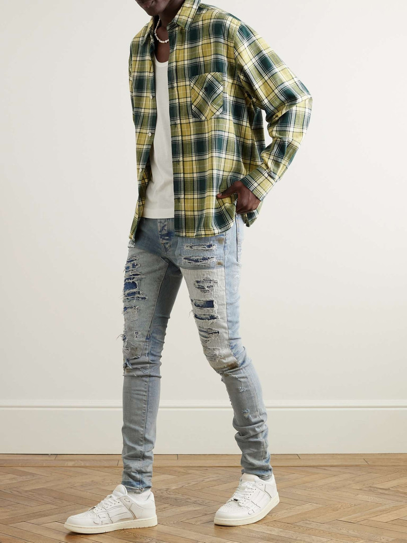 AMIRI Skinny-Fit Logo-Embroidered Distressed Patchwork Jeans outlook