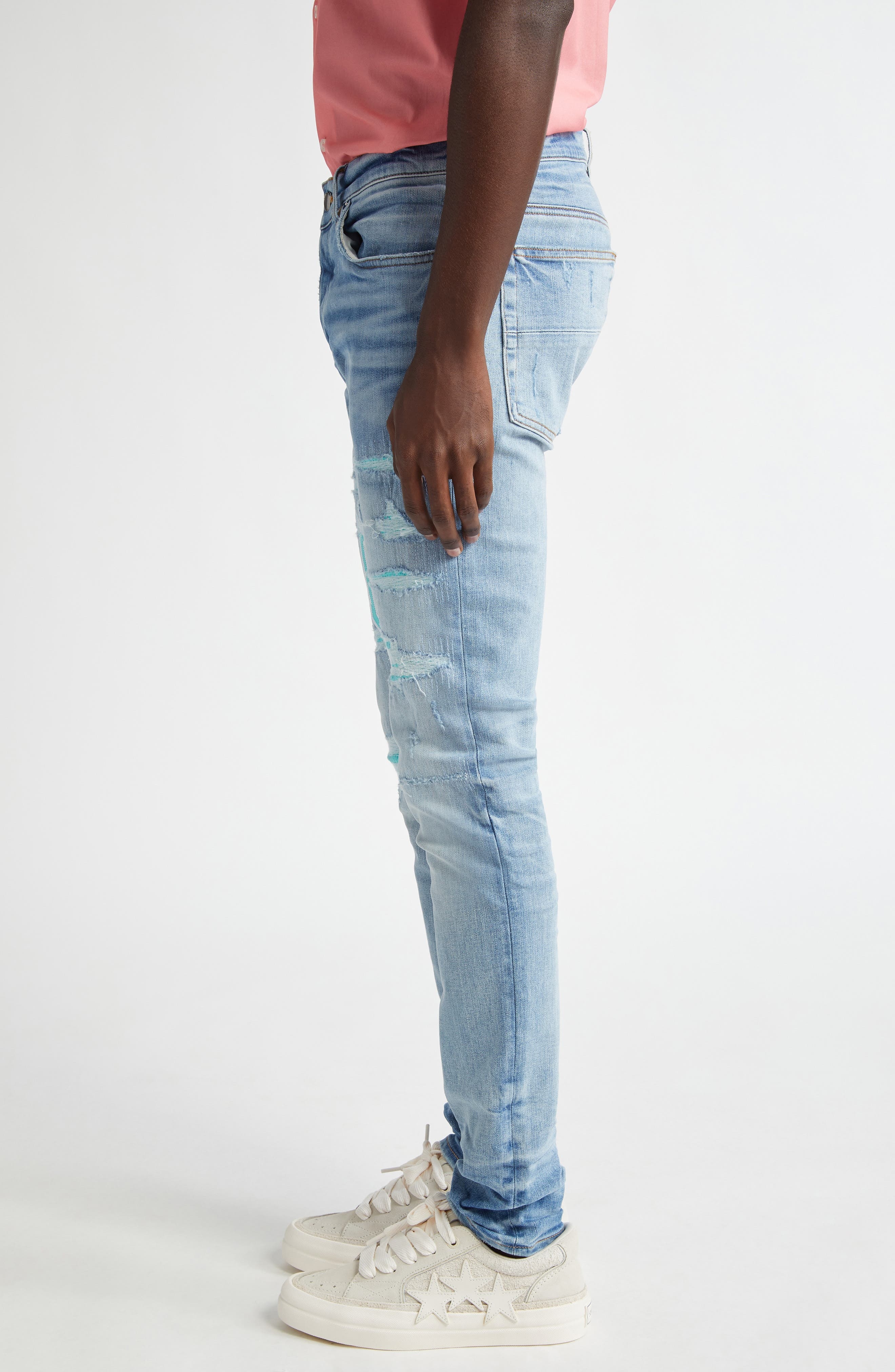 AMIRI Varsity Logo Rip & Repair Skinny Fit Jeans in Perfect Indigo at Nordstrom - 4