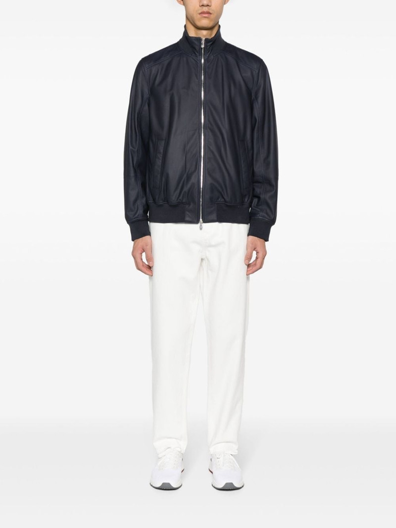 Brunello Cucinelli logo-embroidered tapered cotton jeans outlook