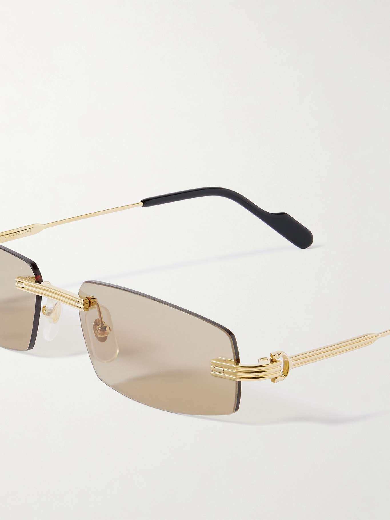 Cartier Première de Cartier rimless rectangular-frame gold-tone ...
