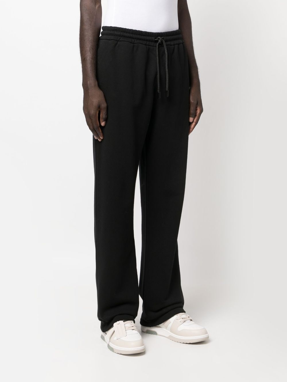 Diag-embroidered cotton track pants - 3
