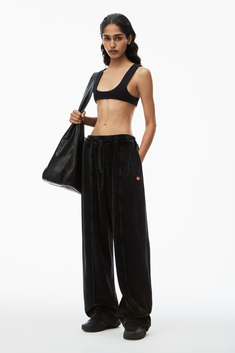 Alexander Wang apple logo track pant in velour outlook