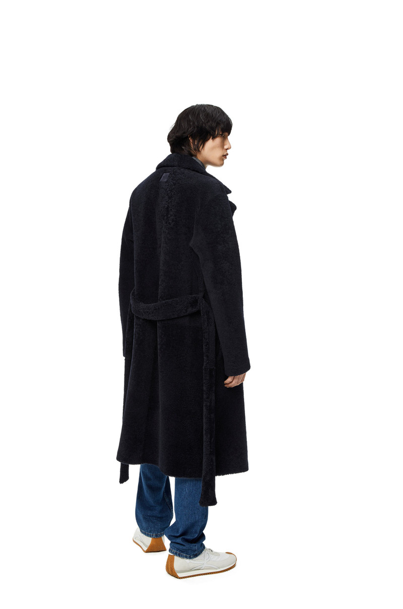 Double breasted coat in shearling 4