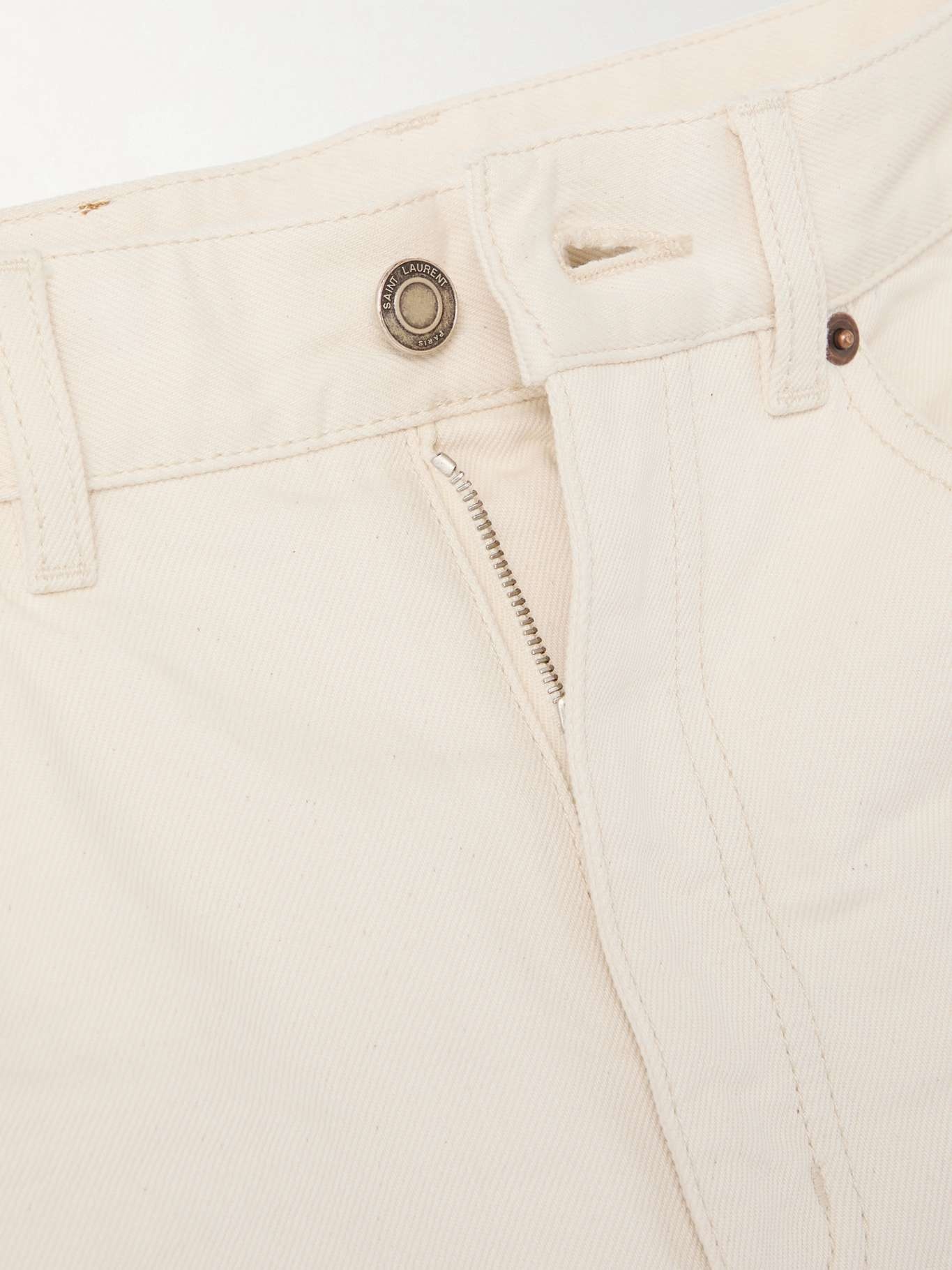SAINT LAURENT High-rise bootcut jeans Off-white | REVERSIBLE