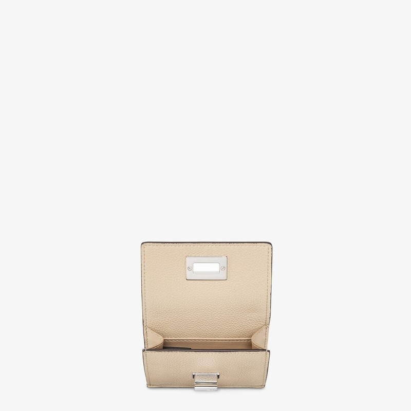 FENDI Compact, tri-fold Peekaboo wallet with large internal bill compartment and three concealed card hold outlook