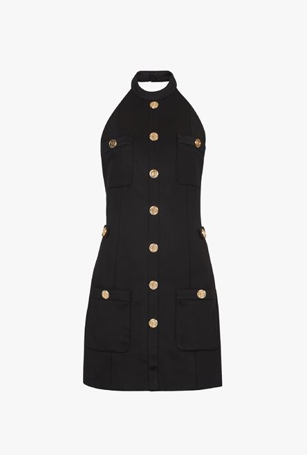 Open-back black dress with gold-tone buttons - 1