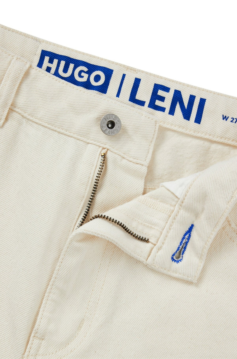 WIDE-LEG RELAXED-FIT JEANS IN DISTRESSED DENIM 6