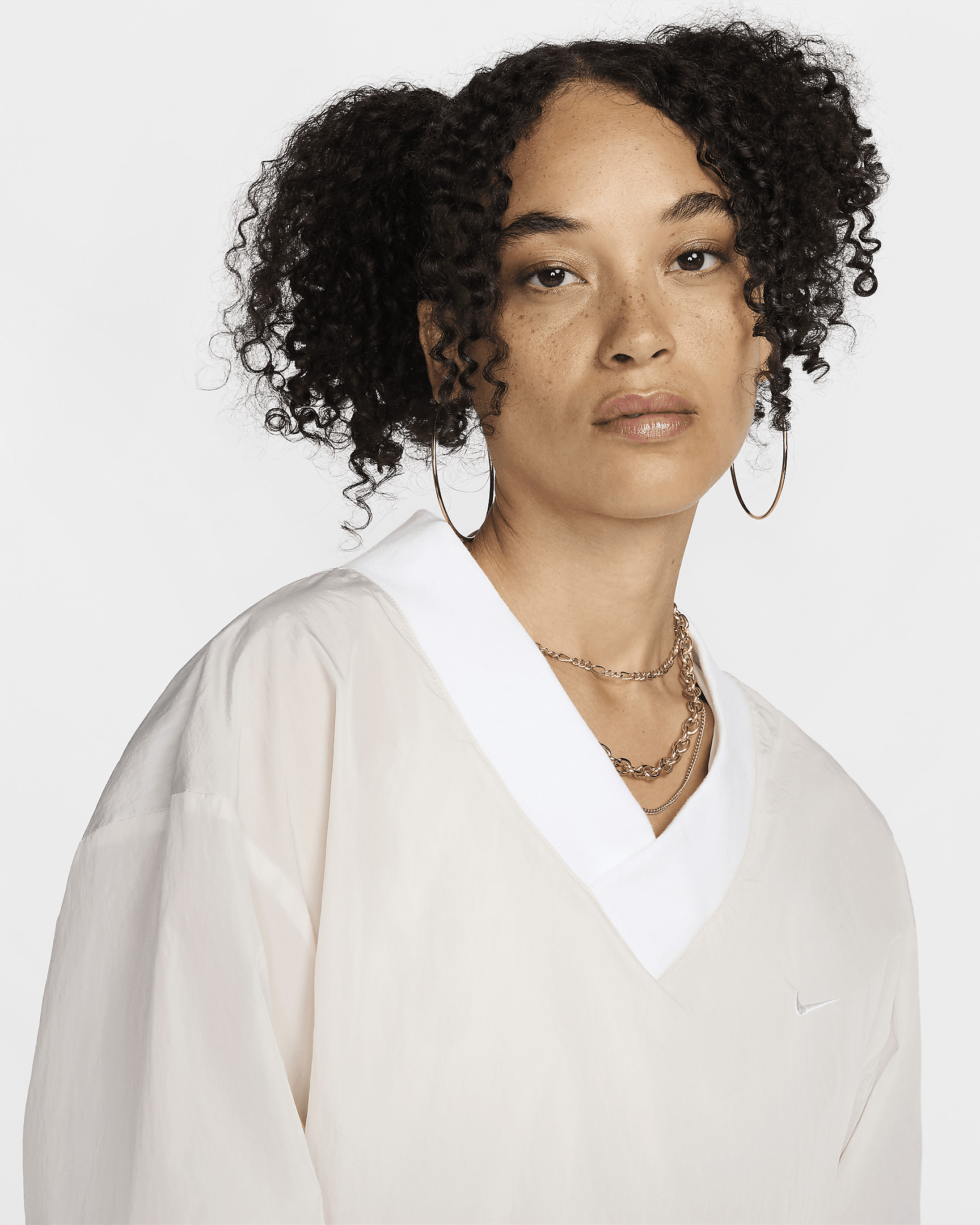 Nike Sportswear Essential Women's Loose UV Woven Long-Sleeve V-Neck Top - 3