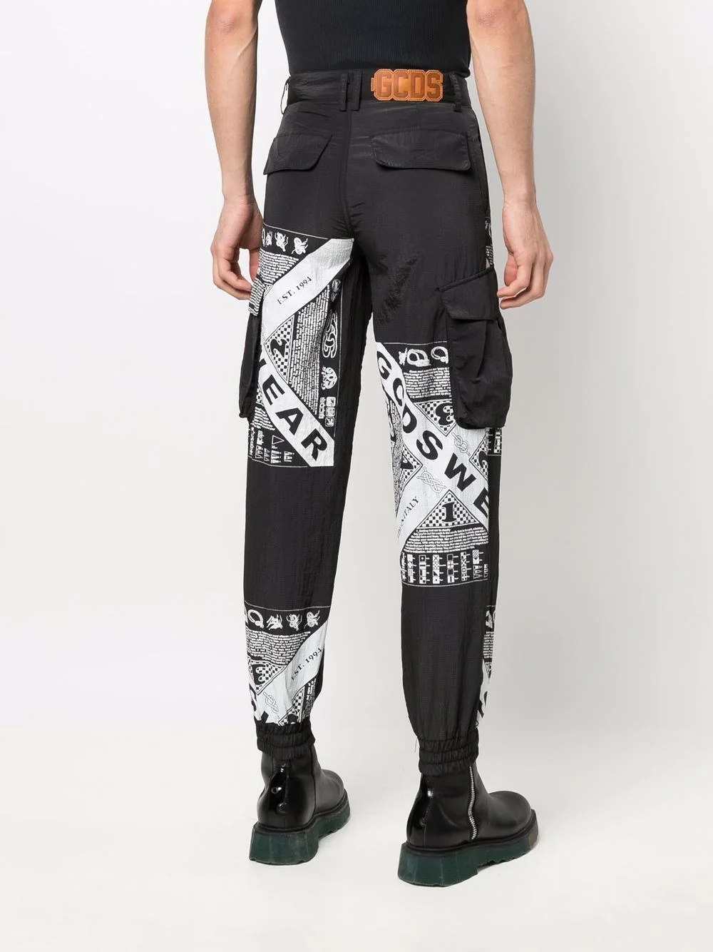 mix-print tapered trousers - 4