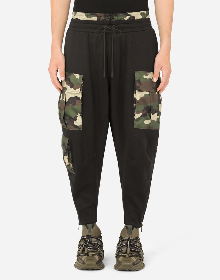 Jogging pants with camouflage-print details - 1