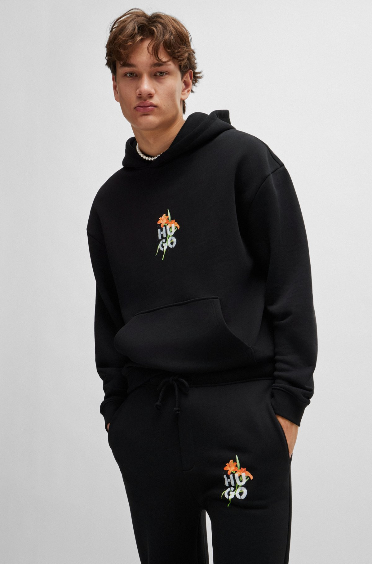 RELAXED-FIT TRACKSUIT BOTTOMS WITH FLORAL LOGO ARTWORK - 3