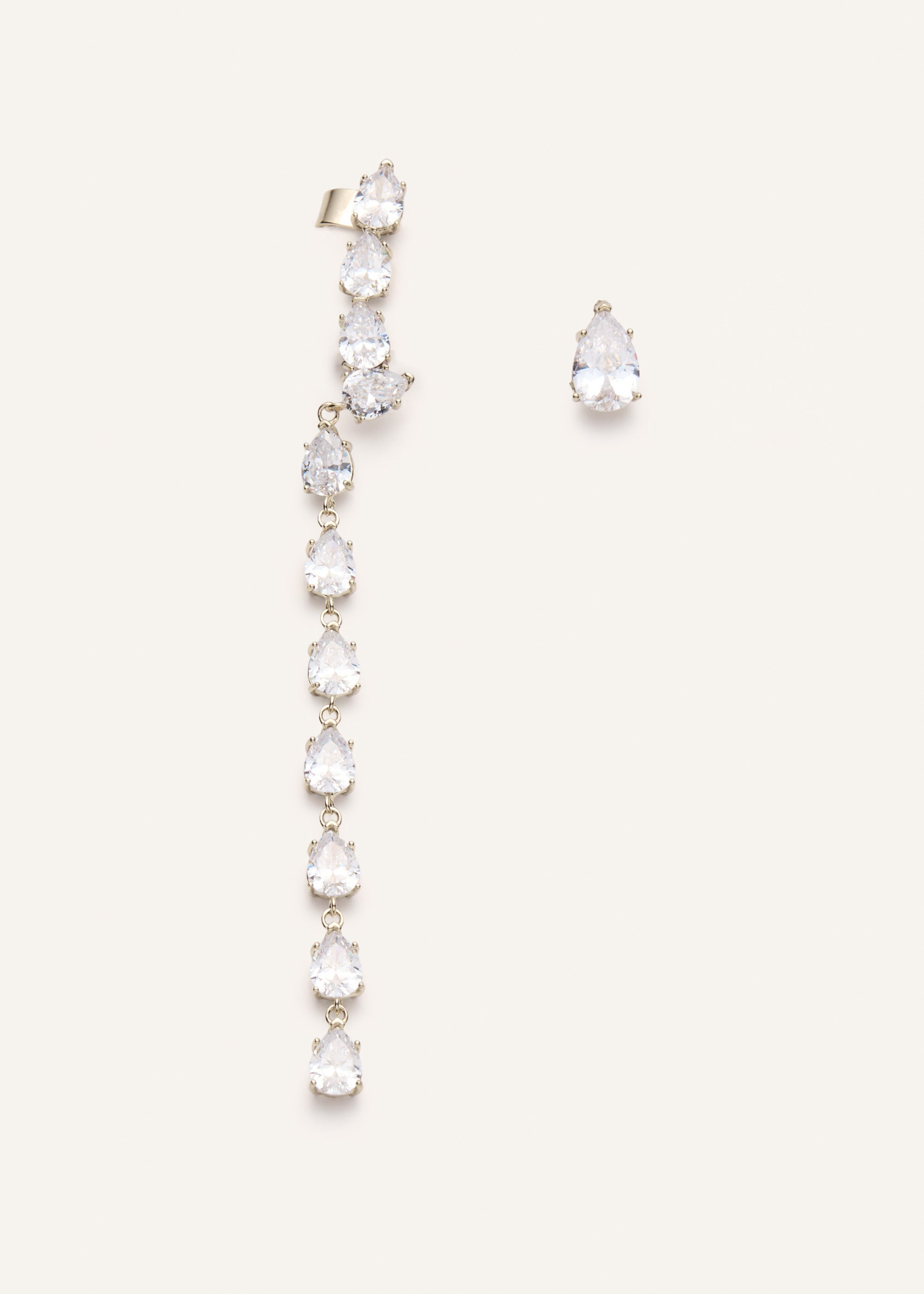 Asymmetrical crystal drop earring set in gold - 1