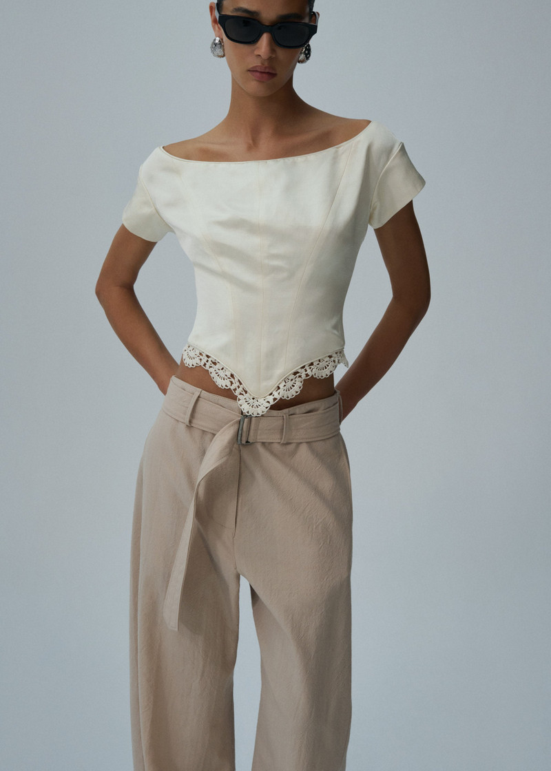 MAGDA BUTRYM Lace trim short sleeve corset top in cream outlook