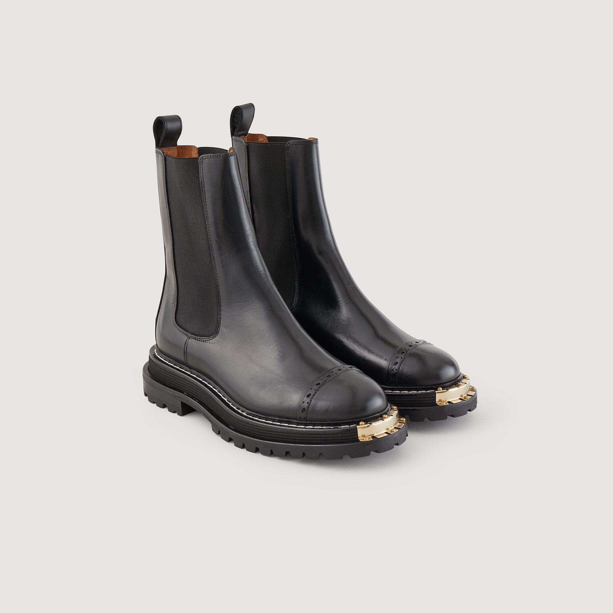 Ankle boots with notched sole - 2