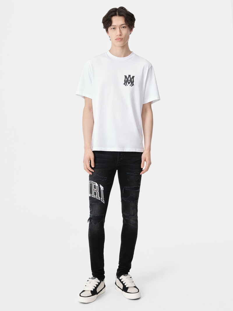 AMIRI VARSITY LOGO REPAIR JEAN outlook