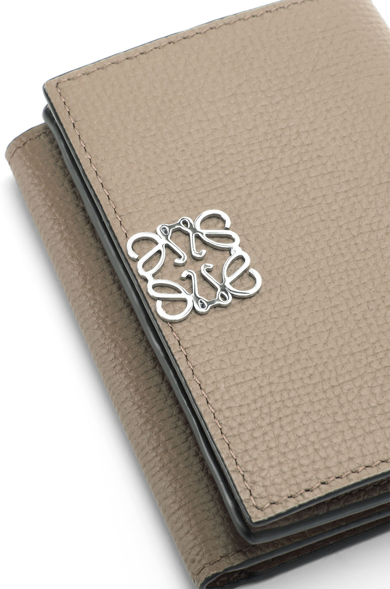 Anagram trifold wallet in pebble grain calfskin 6