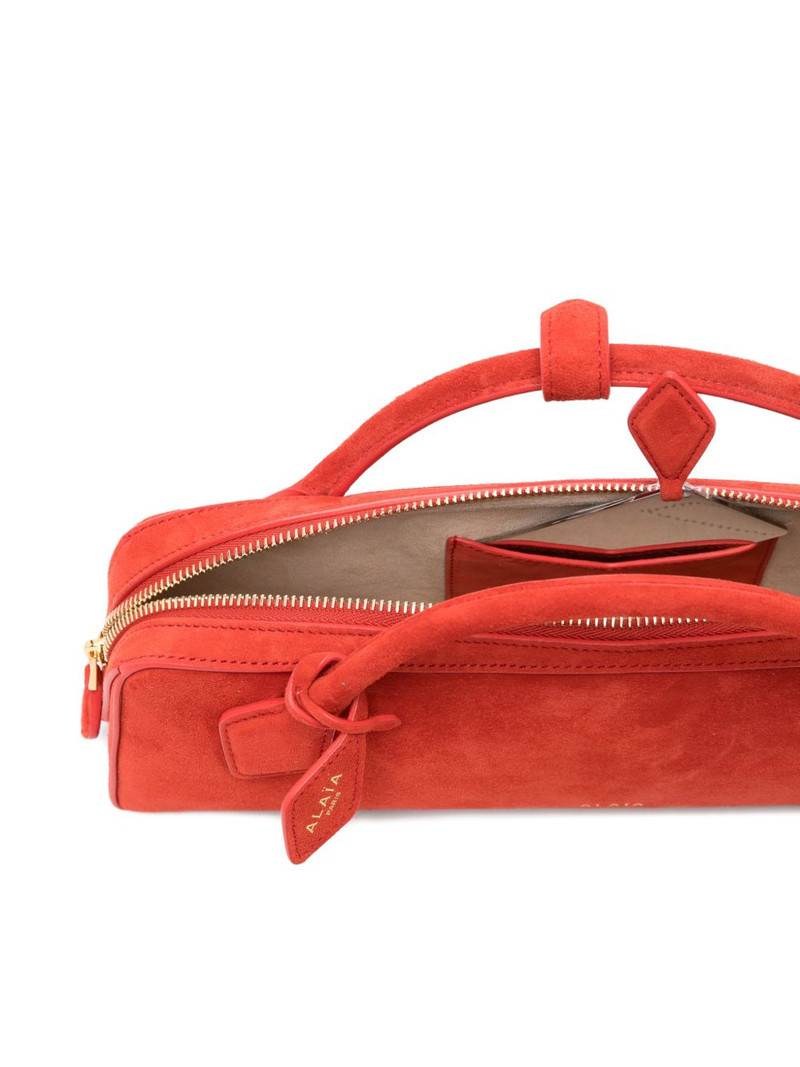 Le Teckel top handle clutch bag 5