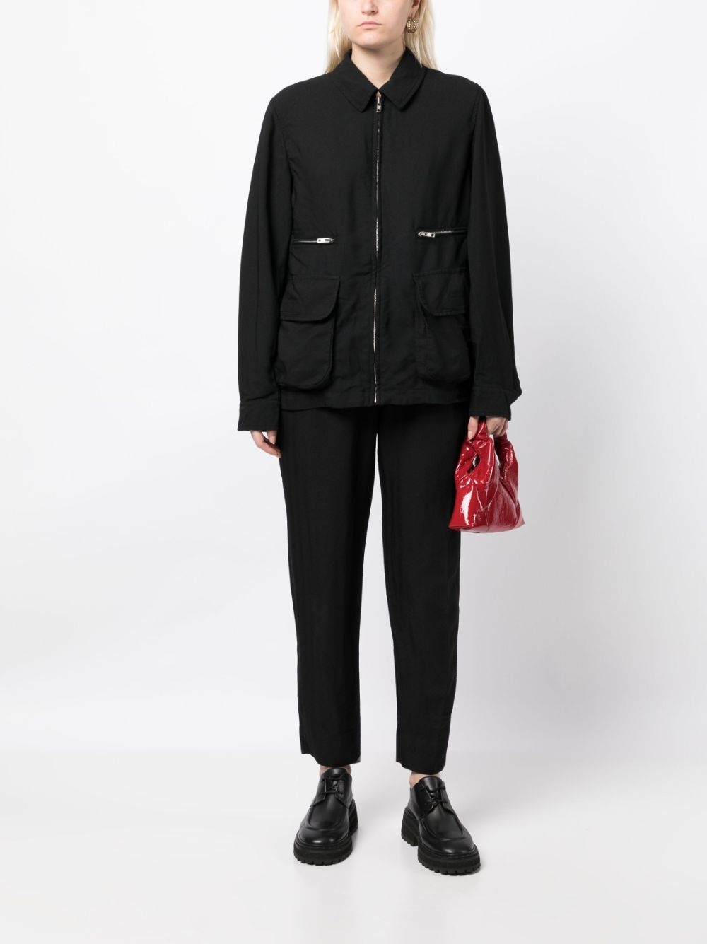 chevron-pattern tapered trousers - 2