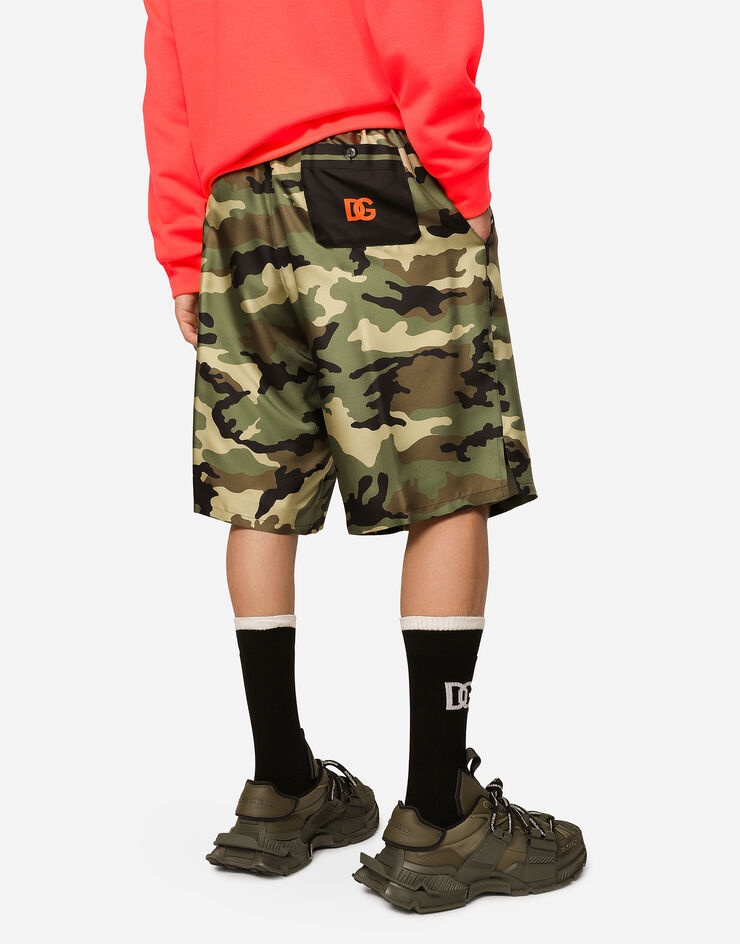 Silk shorts with camouflage print and patch - 1