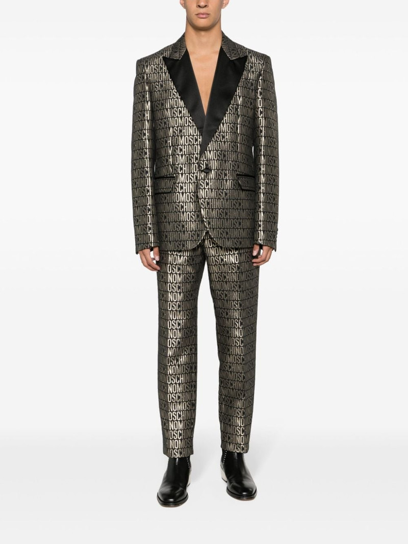 Moschino slim-cut logo-print trousers outlook
