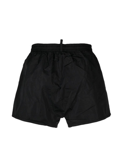 DSQUARED2 logo-print swim shorts outlook