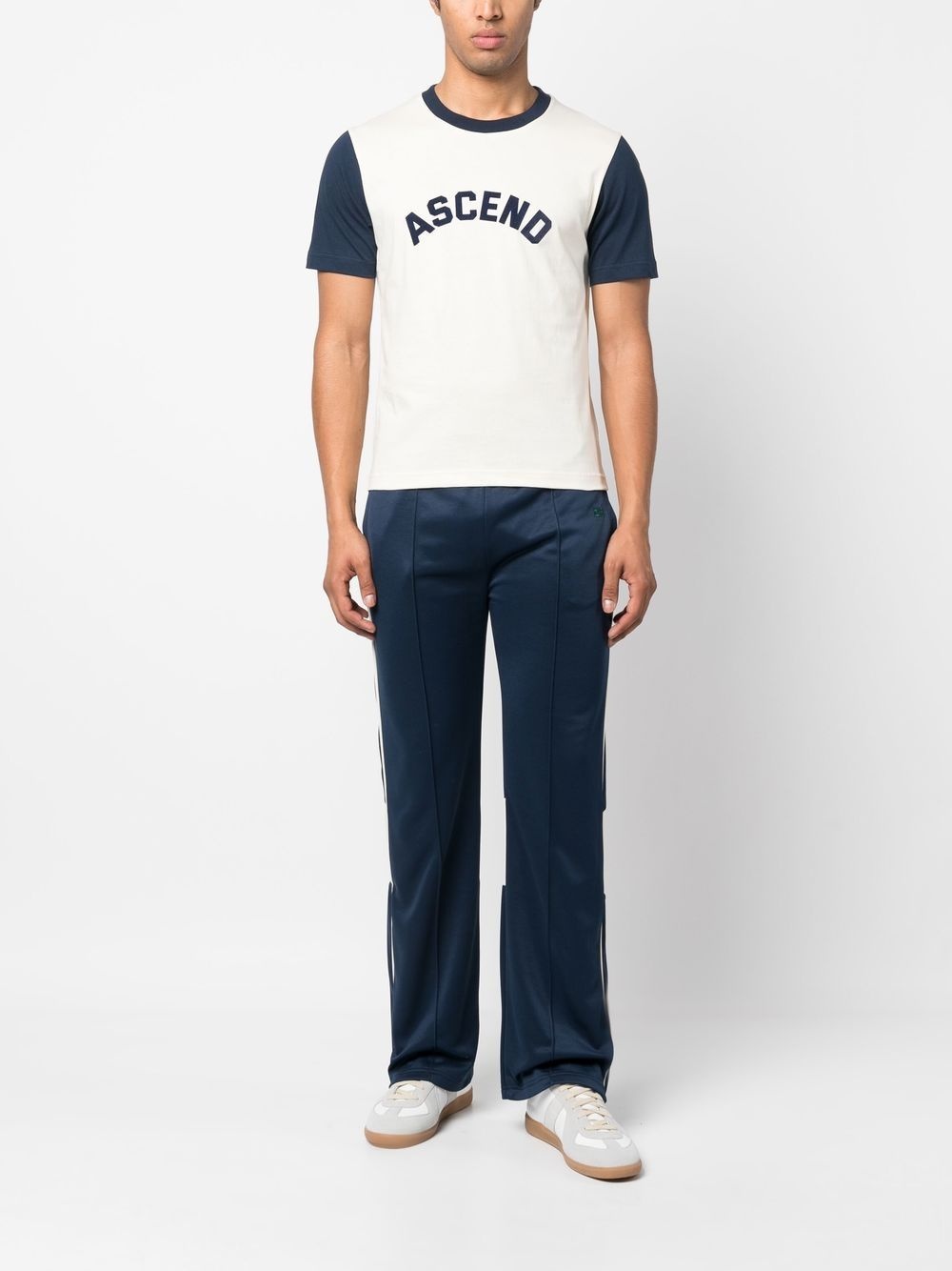 Kola logo-embroidered panelled track pants - 2