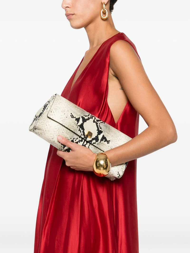 KHAITE snakeskin flap clutch outlook